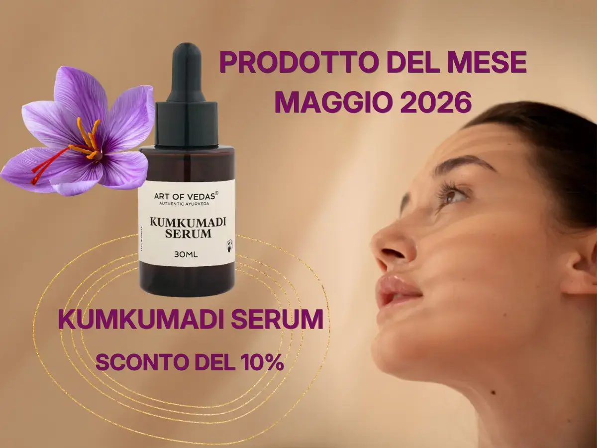 Kumkumadi serum ayurvedico in flacone con pipetta accanto a fiore di zafferano, rituale viso illuminante con sconto 10% maggio 2026